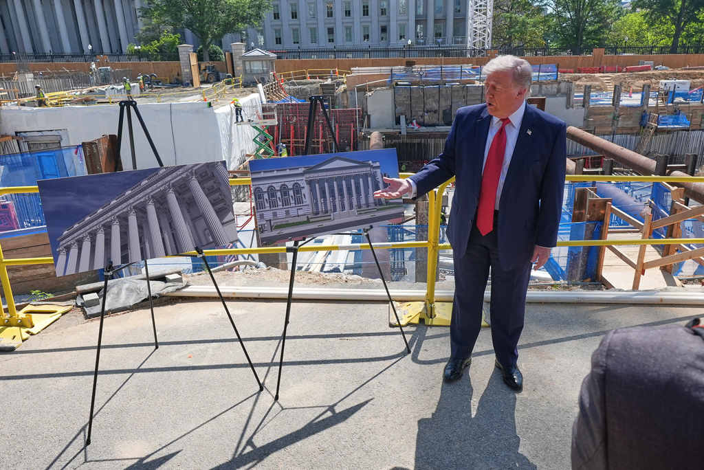 President Donald Trump tours Ballroom construction around the outside the White House, Tuesday, May 19, 2026, in Washington. (AP Photo/Jacquelyn Martin)