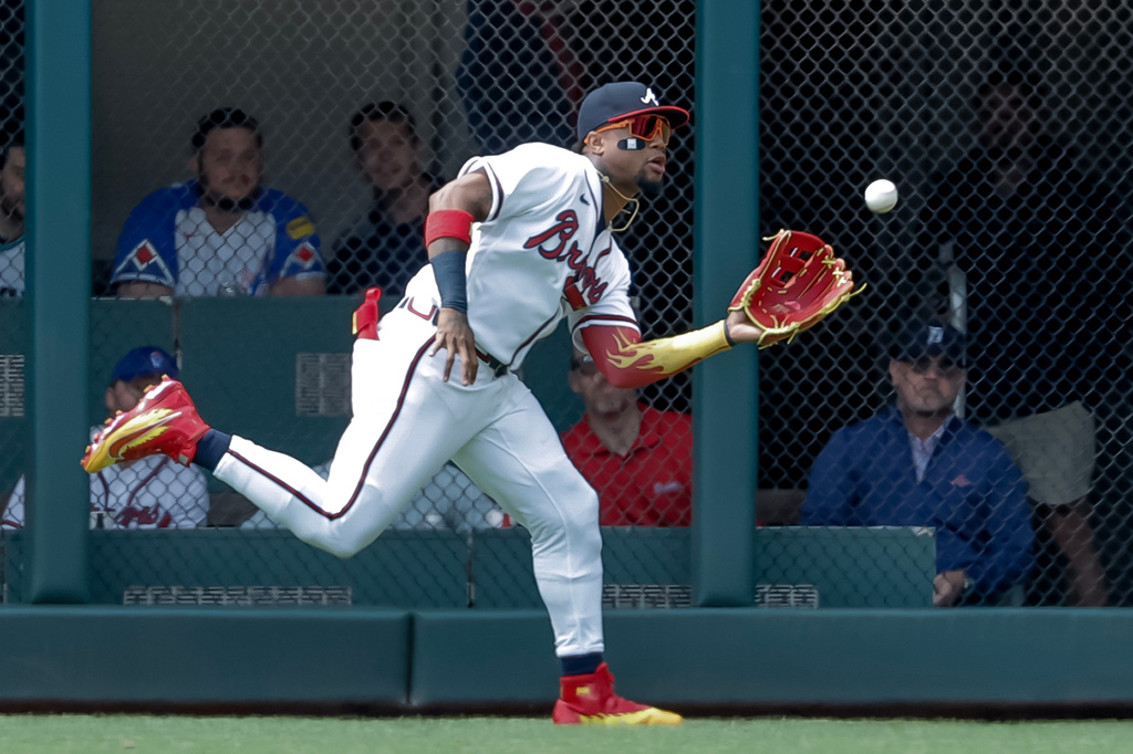 Atlanta Braves right fielder Ronald Acuna Jr. (13) catches a fly-out hit by Detroit Tigers' Gleyber Torres (25) during the first inning of a baseball game, Thursday, April 30, 2026, in Atlanta. (AP Photo/Erik S. Lesser)