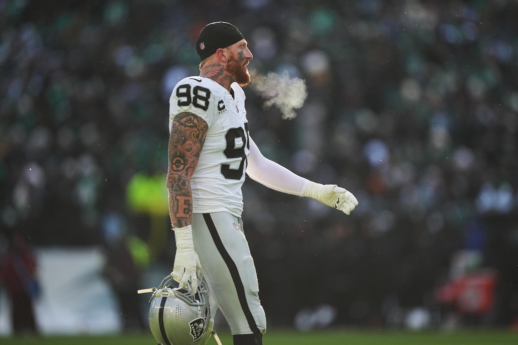 Las Vegas Raiders defensive end Maxx Crosby (98) walks on the field during the first half of an NFL football game against the Philadelphia Eagles on Sunday, Dec. 14, 2025, in Philadelphia. (AP Photo/Matt Rourke)