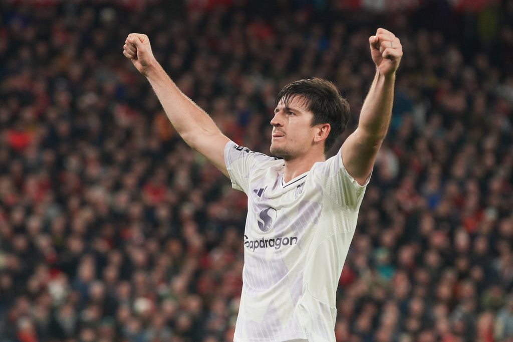 Manchester United's Harry Maguire celebrates after scoring his side's second goal during the English Premier League soccer match between Liverpool and Manchester United in Liverpool, England, Sunday, Oct. 19, 2025. (AP Photo/Ian Hodgson)