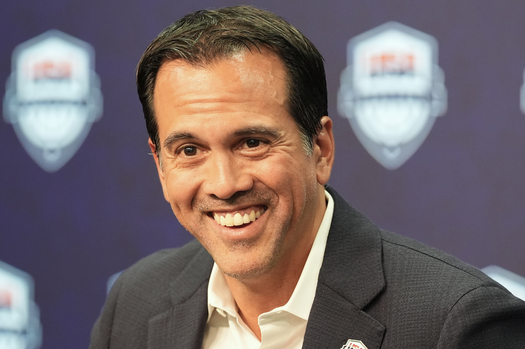 Erik Spoelstra, the head coach of the Miami Heat, smiles as he announces that he has accepted the USA Basketball men's national team head coach position during a news conference Thursday, Oct. 16, 2025, in Miami. (AP Photo/Marta Lavandier)