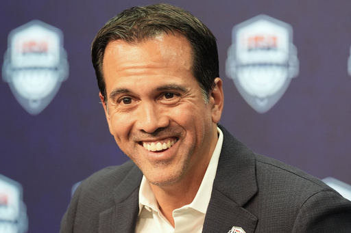 Erik Spoelstra, the head coach of the Miami Heat, smiles as he announces that he has accepted the USA Basketball men's national team head coach position during a news conference Thursday, Oct. 16, 2025, in Miami. (AP Photo/Marta Lavandier) Erik Spoelstra, the head coach of the Miami Heat, smiles as he announces that he has accepted the USA Basketball men's national team head coach position during a news conference Thursday, Oct. 16, 2025, in Miami. (AP Photo/Marta Lavandier)