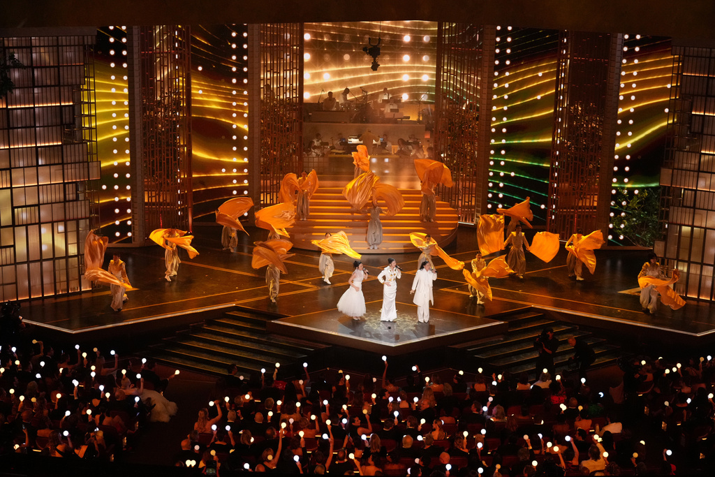 Rei Ami, from left, EJAE, and Audrey Nuna perform 'Golden' from "K-Pop Demon Hunters" during the Oscars on Sunday, March 15, 2026, at the Dolby Theatre in Los Angeles. (AP Photo/Chris Pizzello)