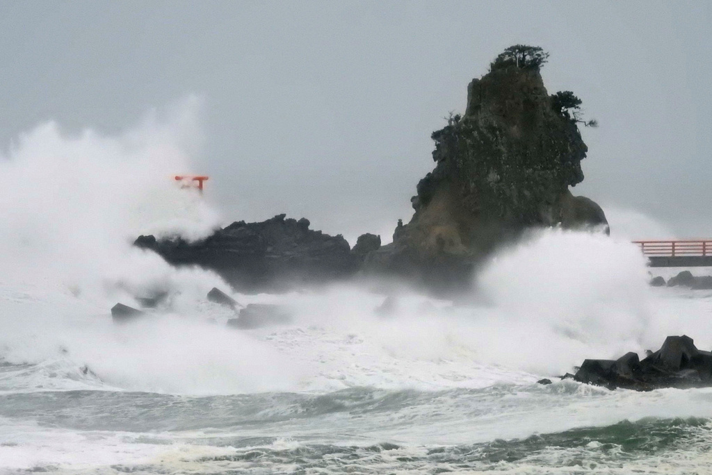 High waves caused by Tropical Storm Chan-hom crash onto a beach in Iwaki, Fukushima prefecture, northern Japan, Tuesday, Aug. 11, 2026. (Seiji Nakamura/Kyodo News via AP)