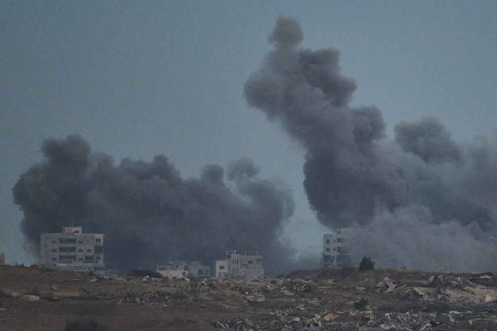 Smoke rises to the sky following an Israeli military strike in the northern Gaza Strip, as seen from southern Israel, Monday, Oct. 6, 2025. (AP Photo/Leo Correa)