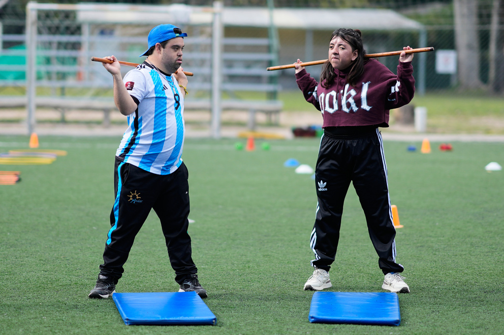 Ramito Fardelli, left, and Priscila Segovia exercise at a nonprofit center that supports people with disabilities in Moreno, on the outskirts of Buenos Aires, Argentina, Tuesday, May 5, 2026. (AP Photo/Natacha Pisarenko)