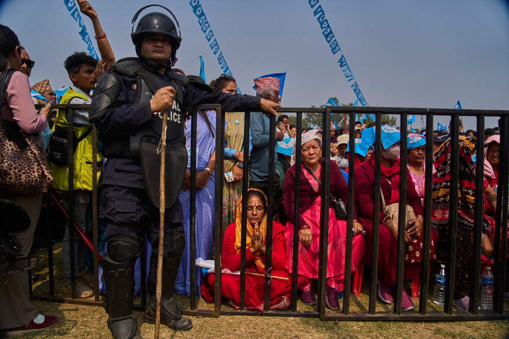 Supporters of the Rastriya Swatantra Party wait for the arrival of rapper-turned-politician Balendra Shah during an election campaign rally in Chitwan, approximately 180 kilometers (112 miles) west of Kathmandu, Nepal, Friday, Feb. 27, 2026. (AP Photo/Niranjan Shrestha)