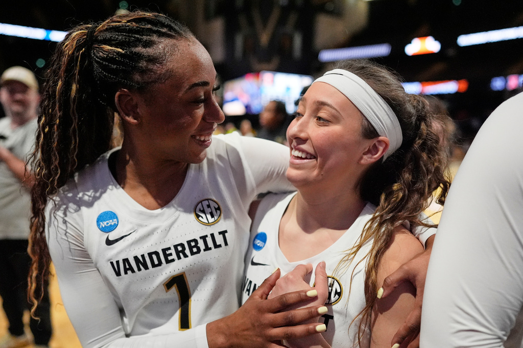 Vanderbilt guard Mikayla Blakes (1) and guard Aubrey Galvan, right, celebrate after winning against Illinois in the second round of the NCAA college basketball tournament Monday, March 23, 2026, in Nashville, Tenn. (AP Photo/George Walker IV)