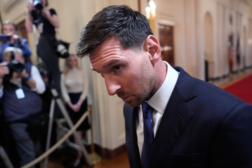 Lionel Messi arrives with President Donald Trump for an event to honor the 2025 Major League Soccer champions Inter Miami CF in the East Room of the White House, Thursday, March 5, 2026, in Washington. (AP Photo/Alex Brandon)