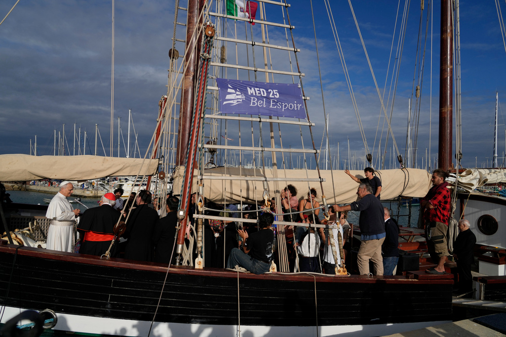 FILE - Pope Leo XIV, left, arrives at the Marina of Ostia, near Rome, for a visit to the "Med 25 - Bel Espoir" Peace Training Ship, Oct. 17, 2025. (AP Photo/Gregorio Borgia, File)
