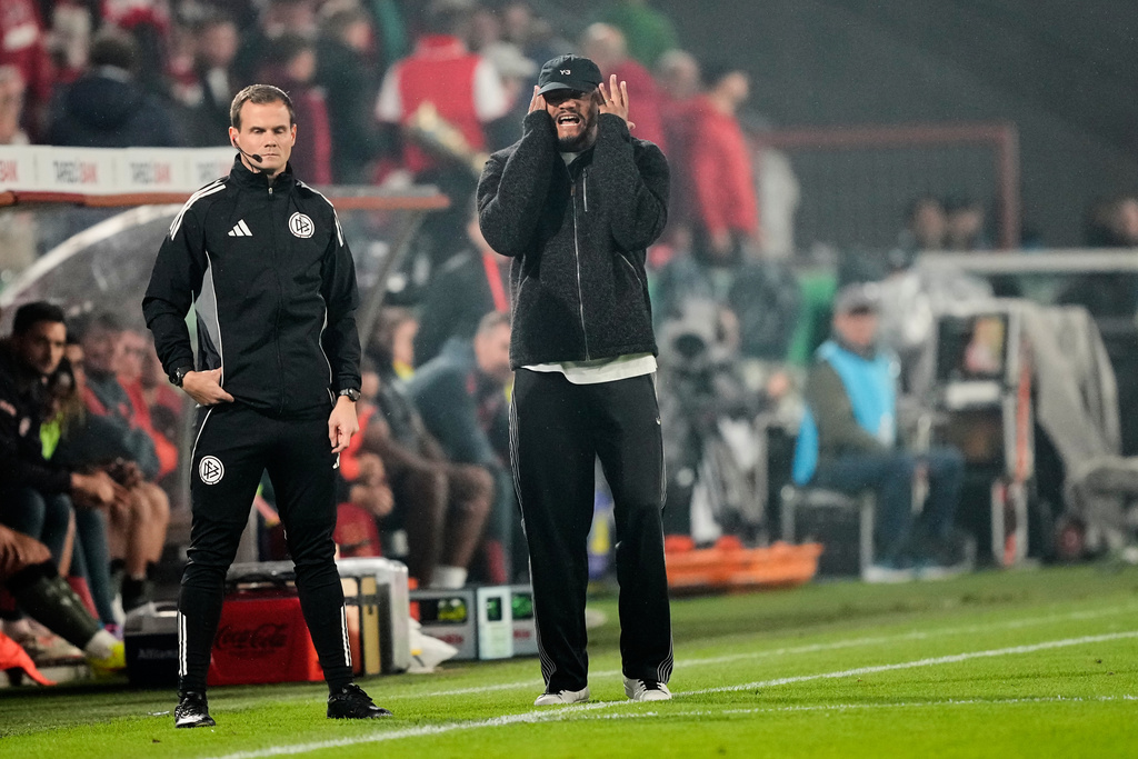Bayern's head coach Vincent Kompany reacts during the German soccer cup match between Cologne and FC Bayern Munich in Cologne, Wednesday, Oct. 29, 2025. (AP Photo/Martin Meissner)