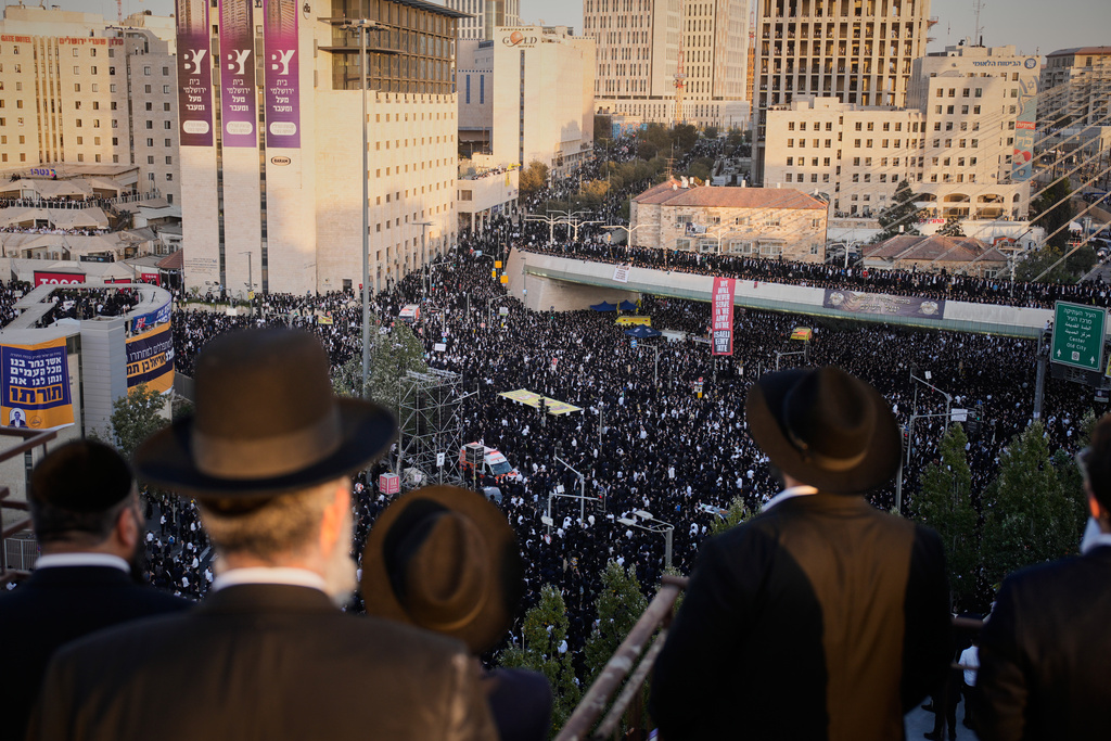 Ultra-Orthodox Jewish men attend a rally against plans to force them to serve in the Israeli military, in Jerusalem, Thursday, Oct. 30, 2025. (AP Photo/Ohad Zwigenberg)