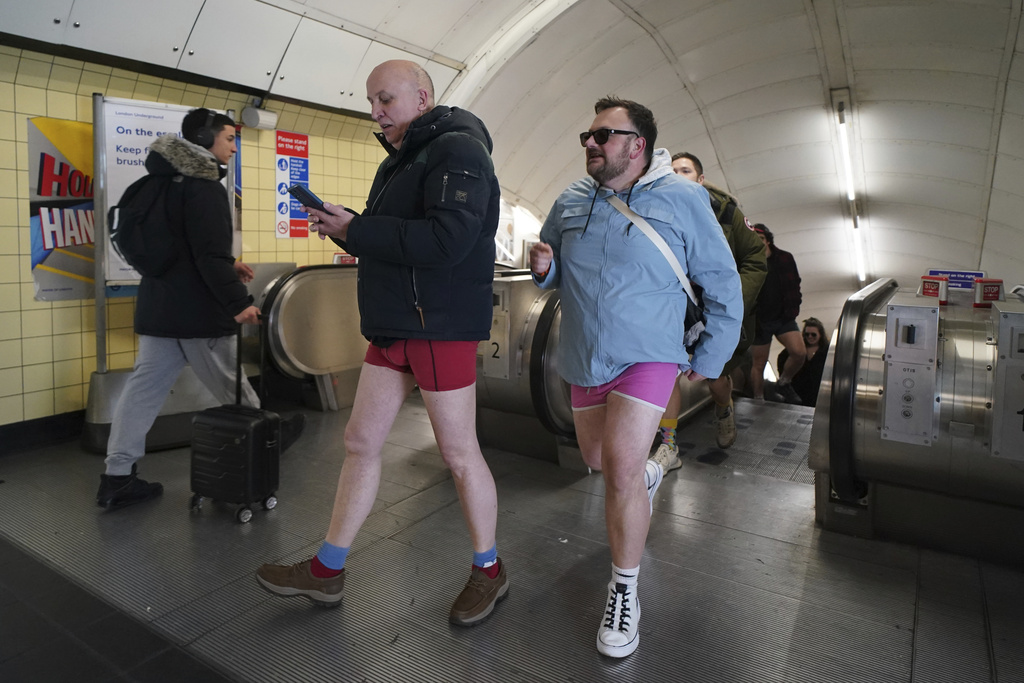 No pants? No problem. London subway riders bare their legs to brighten