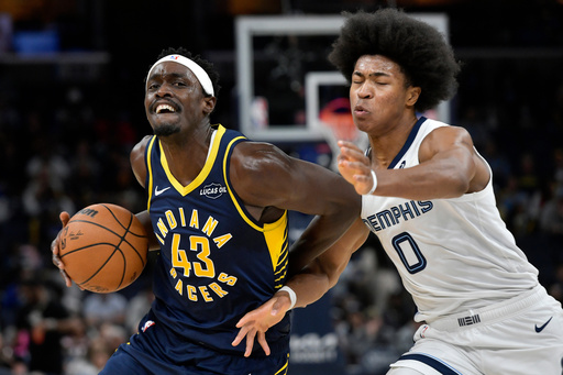 Indiana Pacers forward Pascal Siakam (43) handles the ball against Memphis Grizzlies forward Jaylen Wells (0) in the first half of an NBA basketball game Saturday, Oct. 25, 2025, in Memphis, Tenn. (AP Photo/Brandon Dill) Indiana Pacers forward Pascal Siakam (43) handles the ball against Memphis Grizzlies forward Jaylen Wells (0) in the first half of an NBA basketball game Saturday, Oct. 25, 2025, in Memphis, Tenn. (AP Photo/Brandon Dill)