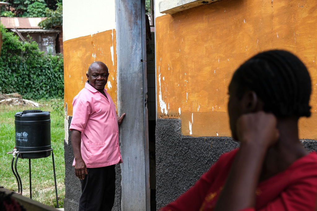 Samuel Kuule, a nurse and survivor of the first Ebola Bundibugyo strain in 2007, stands at Kikyo Health Centre IV in Kikyo Trading village, Bundibugyo District, Uganda, Wednesday, June 3, 2026. (AP Photo/Hajarah Nalwadda)