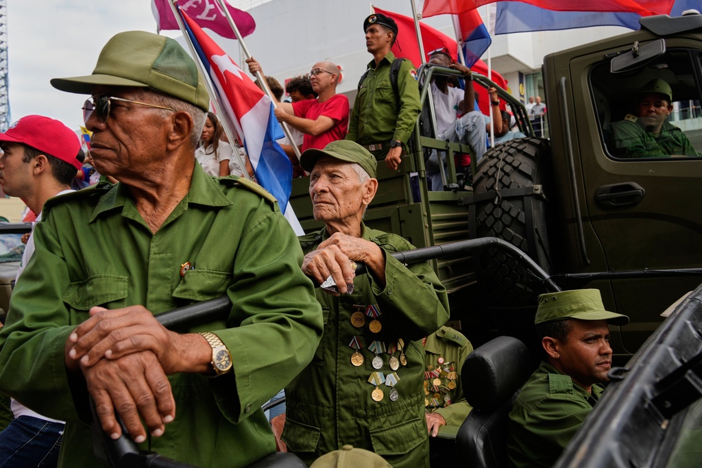 FILE - Veterans of the 1959 Cuban Revolution take part in a parade marking the anniversary of Fidel Castro's arrival to the capital as the head of the rebel army, in Havana, Jan. 8, 2026. (AP Photo/Ramon Espinosa, File)
