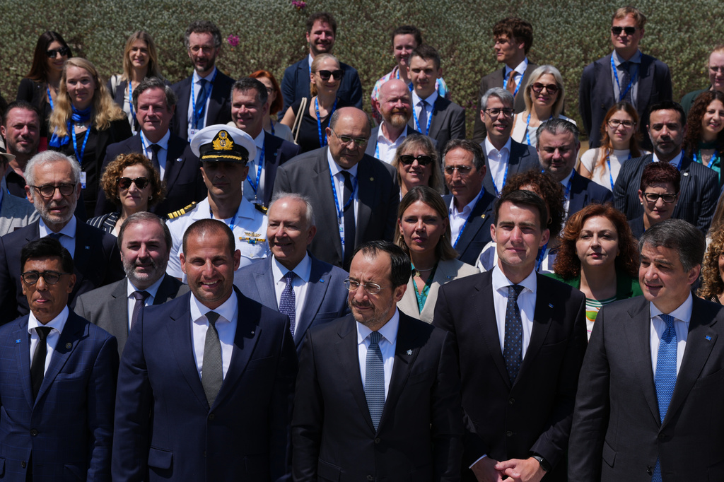 Cyprus' President Nikos Christodoulides, center, Malta's Prime Minister Robert Abela, center left, pose for a family photo during the high-level conference "Strengthening Islands and Coastal Communities of the European Union" in the southwestern coastal city of Paphos on the eastern Mediterranean island of Cyprus, Friday, June 26, 2026. (AP Photo/Petros Karadjias)