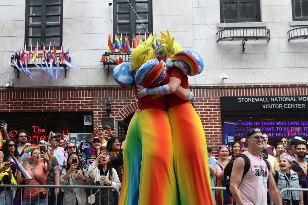Parade-goers attend the NYC Pride March near the Stonewall Inn, Sunday, June 28, 2026 in New York. (AP Photo/Pamela Smith)