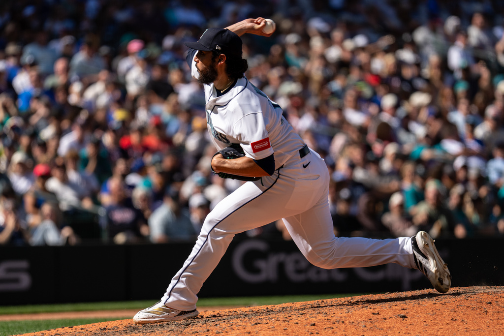 Seattle Mariners reliever Andres Munoz delivers a pitch during the eighth inning of a baseball game against the Minnesota Twins, Saturday, Aug. 1, 2026, in Seattle. (AP Photo/Stephen Brashear)