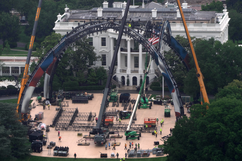Equipment being placed on the South Lawn of the White House is seen from the Washington Monument, Tuesday, May 26, 2026, in Washington. The UFC is holding a mixed martial arts fight on June 14 as part of America 250 celebrations. (AP Photo/Mark Schiefelbein)