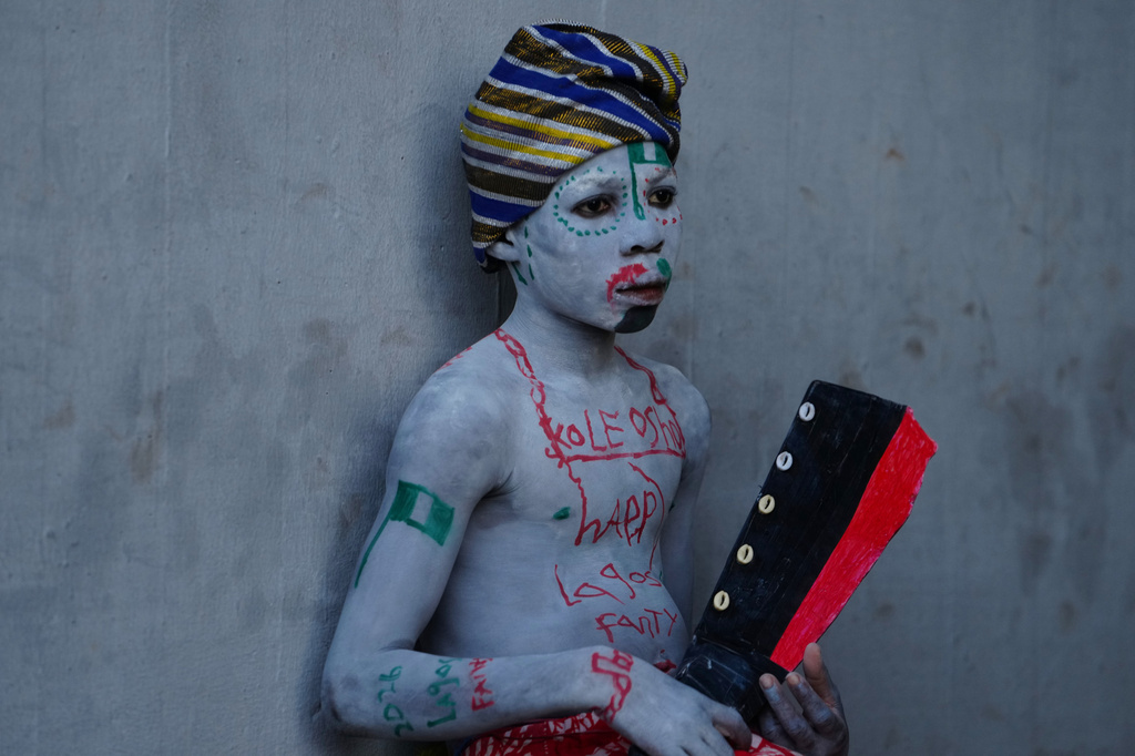 A boy who painted his body attends the Fanti Carnival, in Lagos, Nigeria, Monday, April 6, 2026. (AP Photo/Sunday Alamba)