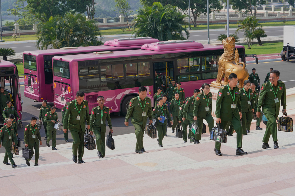 Myanmar's military representatives arrive to attend a session at Union Parliament in Naypyitaw, Myanmar, Thursday, April 9, 2026. (AP Photo/Aung Shine Oo)