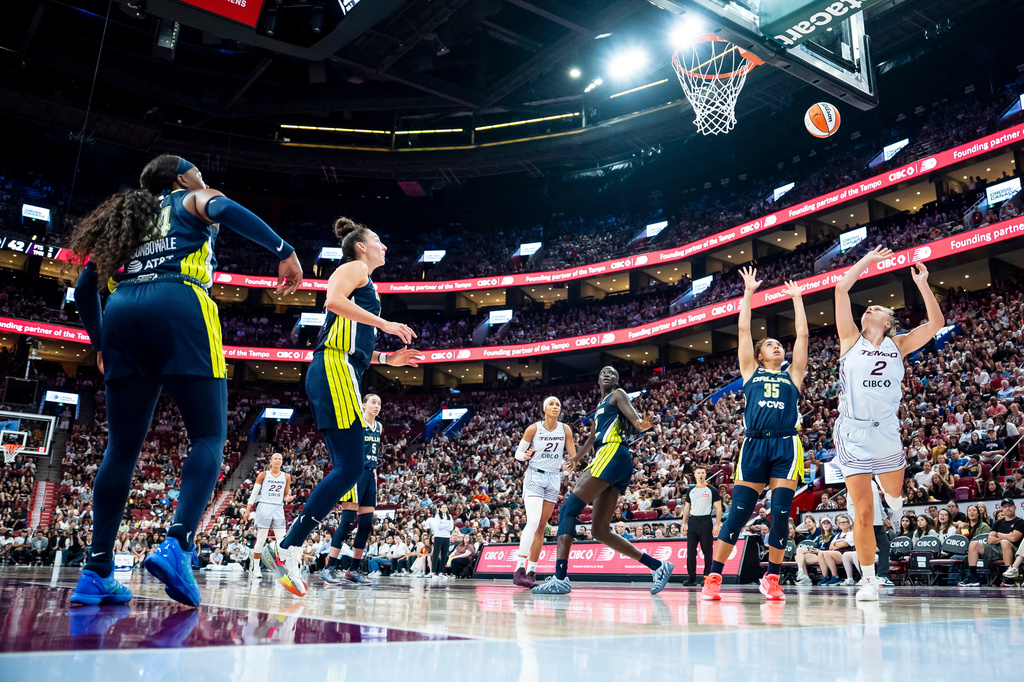 Toronto Tempo's Laura Juskaite (2 ) shoots on the Dallas Wings during first half of a WNBA basketball game, in Montreal on Friday, July 10, 2026. (Christopher Katsarov/The Canadian Press via AP)