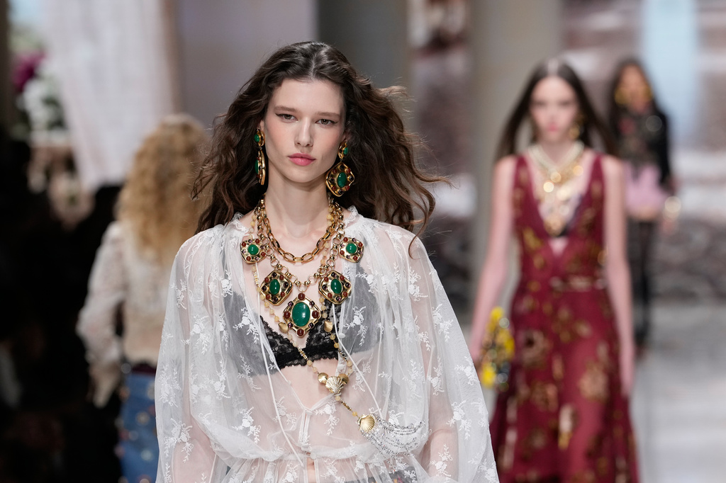 A model wears a creation part of Dolce & Gabbana women's Spring-Summer 2027 collection, presented in Milan, Italy, Saturday, Sept. 26, 2026. (AP Photo/Luca Bruno)