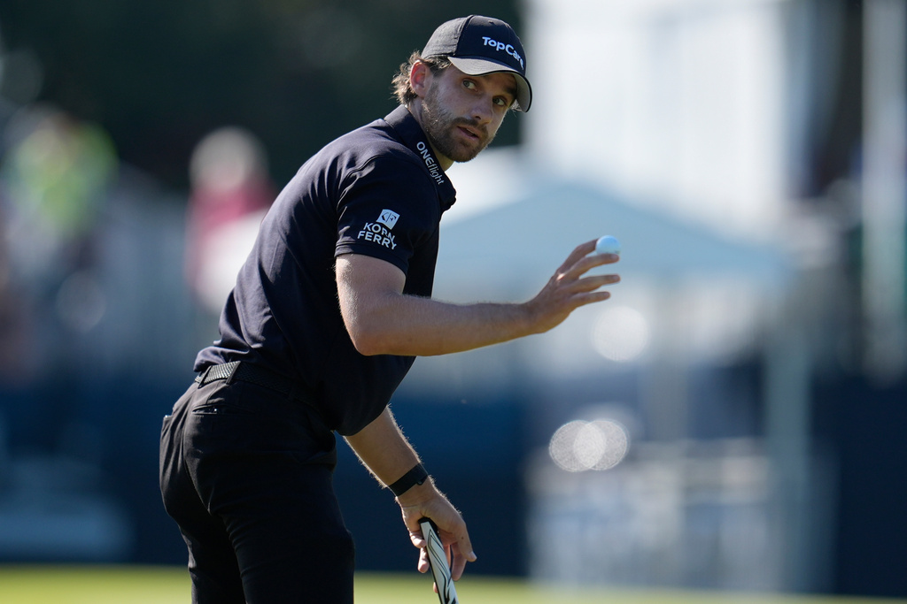 Patrick Rodgers celebrates his birdie putt on the nineth green during the third round of the RSM Classic golf tournament, Saturday, Nov. 22, 2025, in St. Simons Island, Ga. (AP Photo/Mike Stewart)