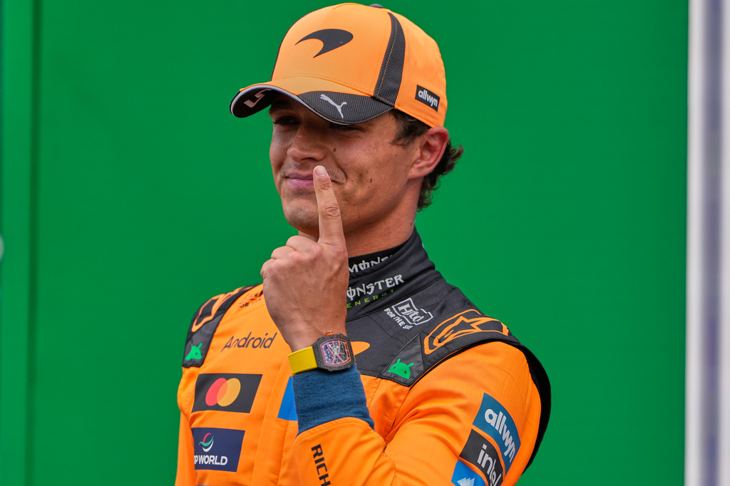 McLaren driver Lando Norris of Britain reacts after winning the pole position in the qualifying for the Formula One Dutch Grand Prix in Zandvoort , Netherlands, Saturday, Aug. 22, 2026. (AP Photo/Darko Bandic)