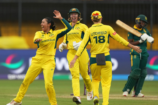 Australia's Alana King, left, celebrates with teammate the wicket of South Africa's Sinola Jafta during the ICC Women's Cricket World Cup match between Australia and South Africa in Indore, India, Saturday, Oct. 25, 2025. (AP Photo/Ajit Solanki) Australia's Alana King, left, celebrates with teammate the wicket of South Africa's Sinola Jafta during the ICC Women's Cricket World Cup match between Australia and South Africa in Indore, India, Saturday, Oct. 25, 2025. (AP Photo/Ajit Solanki)