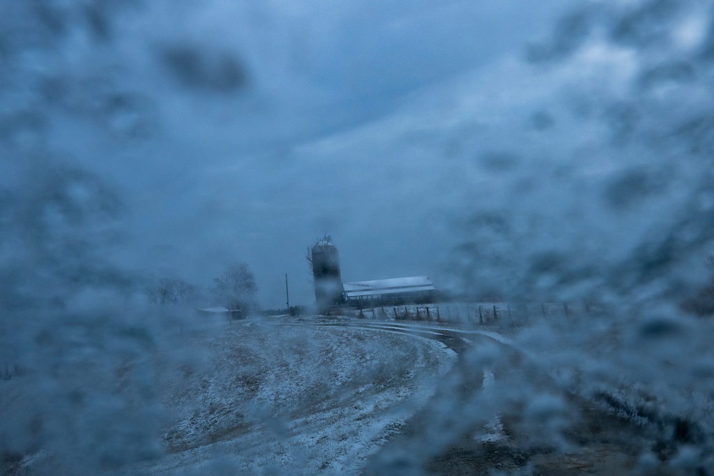 Ice covers a windshield on a farm in Robertson County, Kentucky on Dec. 9, 2025. (AP Photo/Michael Swensen)