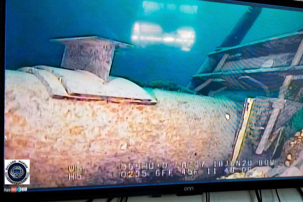 FILE - This photo provided by the Michigan Department of Environment, Great Lakes, and Energy in June 2020 shows damage to anchor support EP-17-1 on the east leg of the Enbridge Line 5 pipeline in the Straits of Mackinac in Michigan, displayed on a television screen. (Michigan Department of Environment, Great Lakes, and Energy via AP, File)