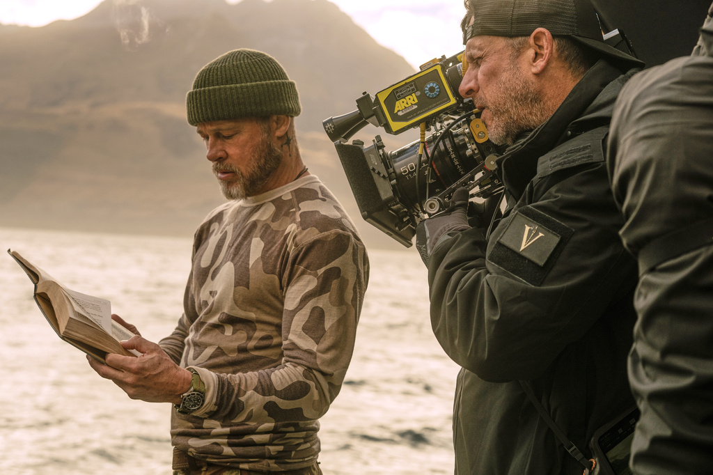 This image released by Paramount Pictures shows Brad Pitt, left, and director David Ayer on the set of "Heart of the Beast." (Scott Garfield/Paramount Pictures via AP)