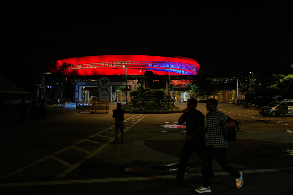 The illuminated Bharat Mandapam, the venue for the BRICS summit, is seen in New Delhi, India, Thursday, Sept. 10, 2026. (AP Photo/Manish Swarup)
