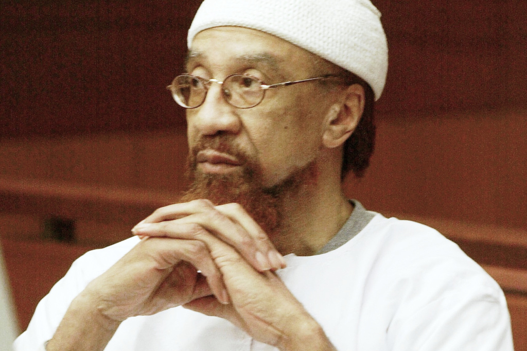 FILE - Jamil Abdullah Al-Amin watches during the sentencing portion of his trial in Atlanta, Monday, March 11, 2002. (AP Photo/Ric Feld, File)