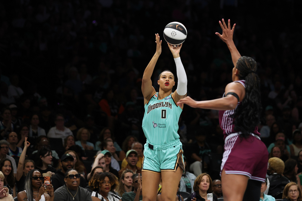 New York Liberty forward Satou Sabally (0) shoots over Toronto Tempo forward Nyara Sabally during the first half of a WNBA basketball game, Wednesday, June 3, 2026, in New York. (AP Photo/Heather Khalifa)