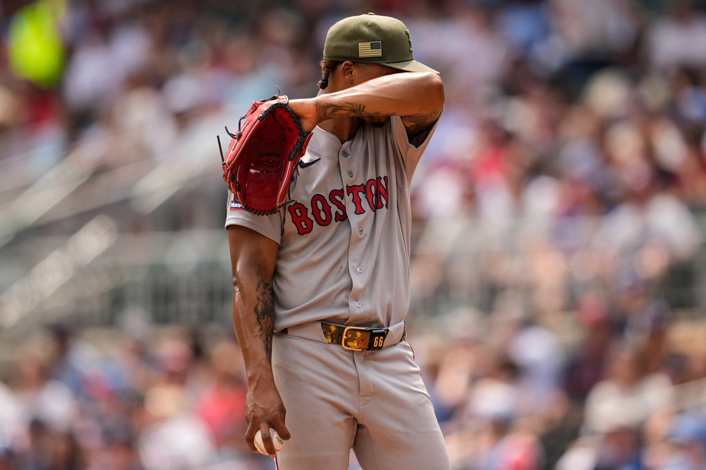 Boston Red Sox pitcher Brayan Bello (66) works in the fifth inning of a baseball game against the Atlanta Braves, Sunday, May 17, 2026, in Atlanta. (AP Photo/Mike Stewart)