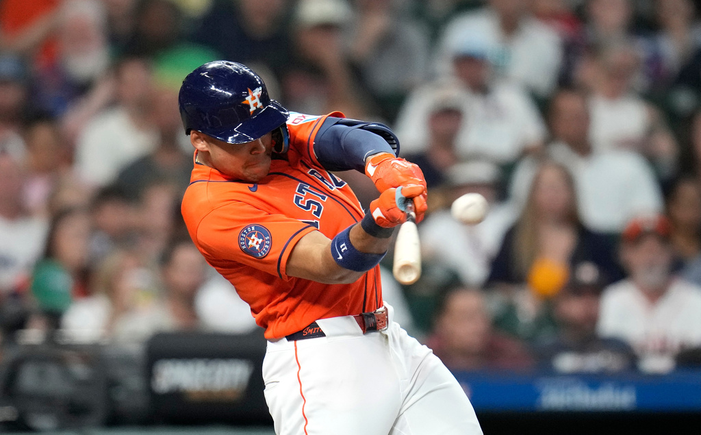 Houston Astros' Cam Smith hits a solo home run off Milwaukee Brewers starting pitcher Coleman Crow during the second inning of a baseball game, Friday, May 29, 2026, in Houston. (AP Photo/Karen Warren)