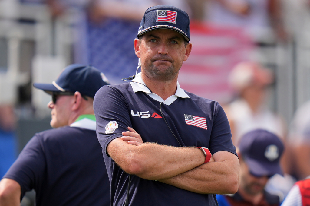 United States captain Keegan Bradley watches on the first hole at Bethpage Black golf course during the Ryder Cup golf tournament, Saturday, Sept. 27, 2025, in Farmingdale, N.Y. (AP Photo/Seth Wenig)