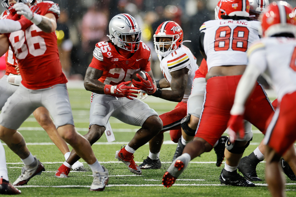 Ohio State running back Bo Jackson (25) breaks through the line of scrimmage to score a touchdown against Maryland during the second half of an NCAA college football game, Saturday, Oct. 10, 2026, in Columbus, Ohio. (AP Photo/Jay LaPrete)
