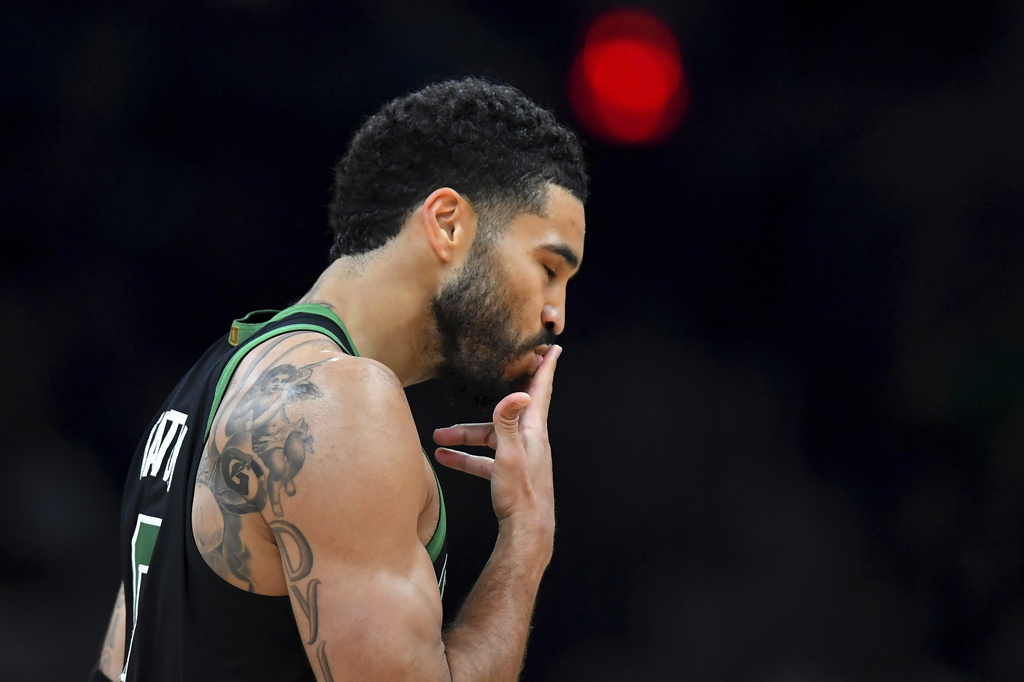 Boston Celtics forward Jayson Tatum celebrates after scoring in the first half of an NBA basketball game against the Toronto Raptors, Sunday, April 5, 2026, in Boston. (AP Photo/Steven Senne)