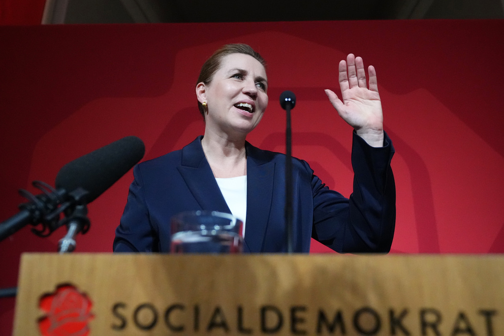 Danish Prime Minister Mette Frederiksen speaks to members of her Social Democratic Party in the Danish Parliament in Copenhagen, Denmark, after the General Election on Tuesday, March 24, 2026. (AP Photo/Sergei Grits)