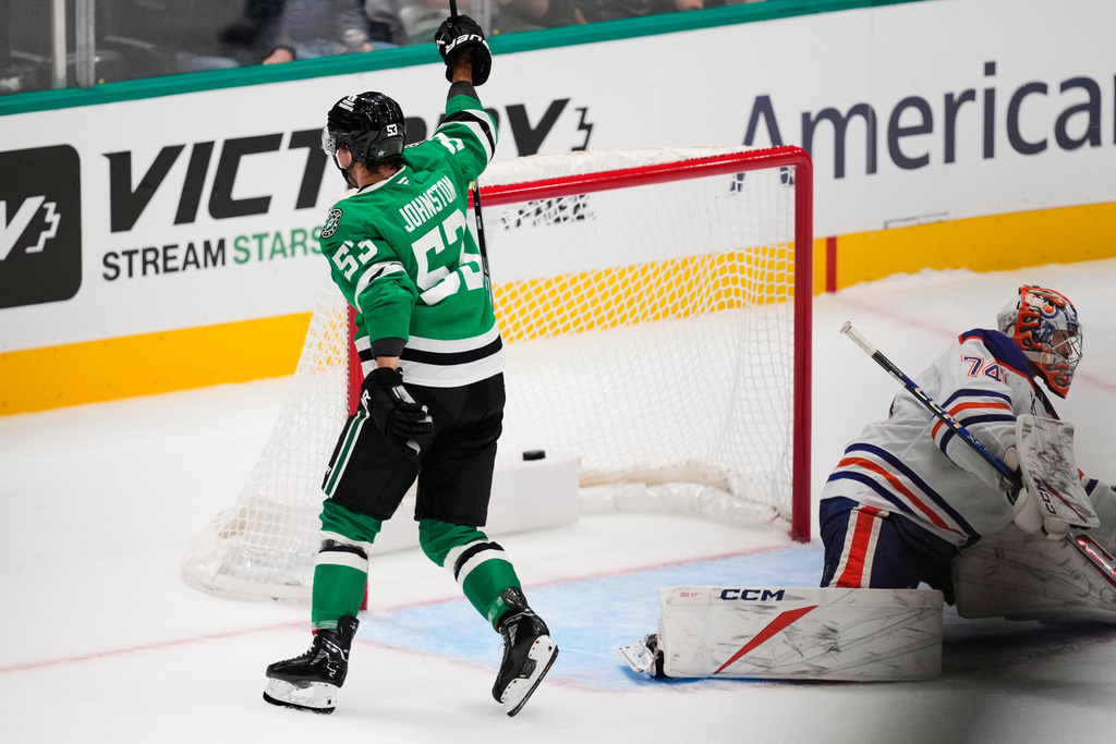 Dallas Stars center Wyatt Johnston (53) celebrates after scoring against Edmonton Oilers' Stuart Skinner (74) in a shootout during an NHL hockey game Tuesday, Nov. 4, 2025, in Dallas. (AP Photo/Tony Gutierrez)