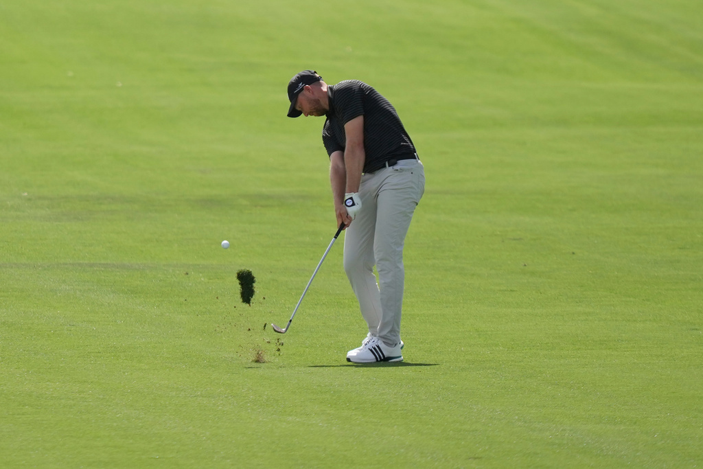 Daniel Berger hits from the 18th fairway during the first round of the Arnold Palmer Invitational at Bay Hill golf tournament Thursday, March 5, 2026, in Orlando, Fla. (AP Photo/Matt Slocum)