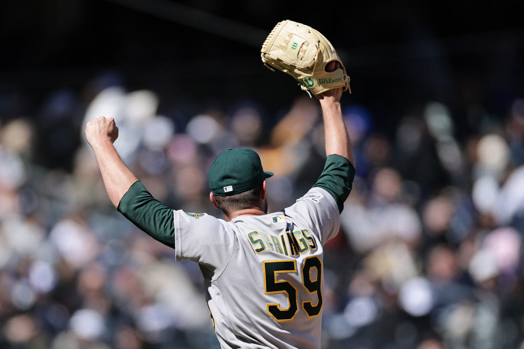 Athletics pitcher Jeffrey Springs reacts after New York Yankees' José Caballero flied out to end the fifth inning of a baseball game Thursday, April 9, 2026, in New York. (AP Photo/Adam Hunger)