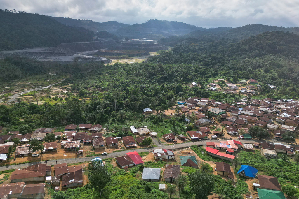 An aerial view shows Bea Mountain's N'dablama mine site and Gold Camp Community, Liberia, July 8, 2025. (AP Photo/Misper Apawu)