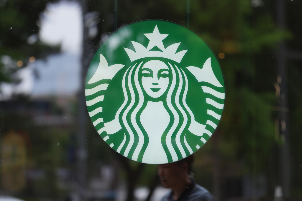 A sign for Starbucks is displayed in Seoul, South Korea, Tuesday, May 26, 2026. (AP Photo/Lee Jin-man)