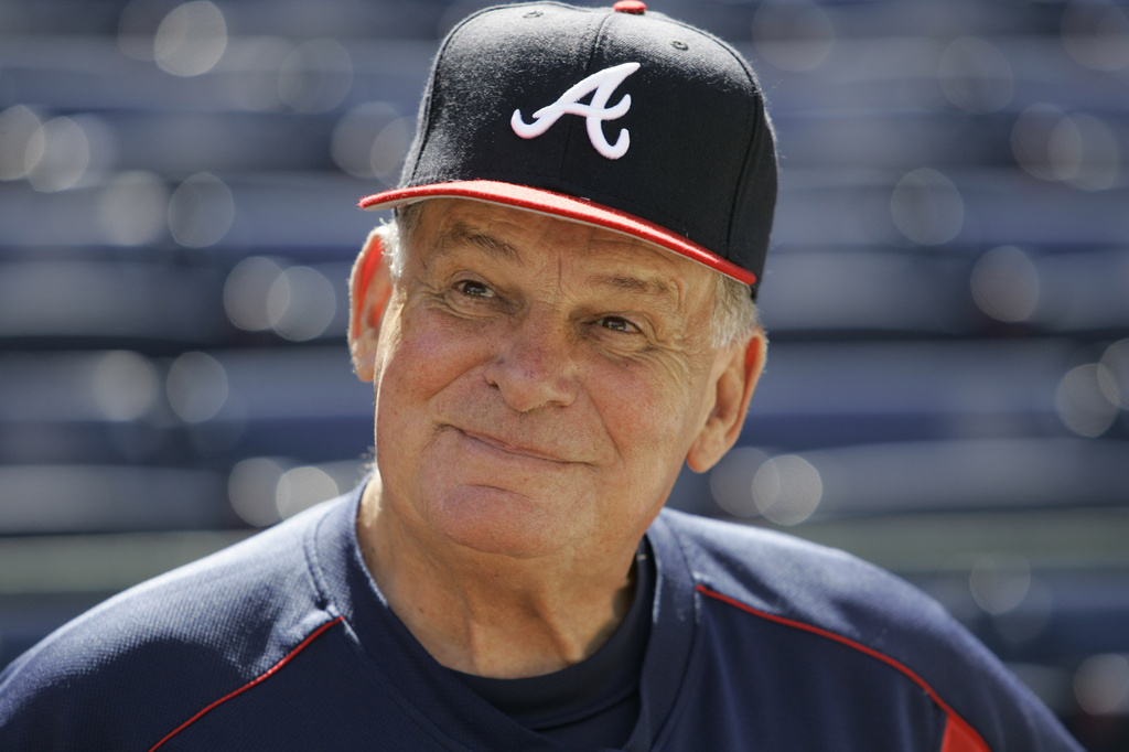 FILE - Atlanta Braves manager Bobby Cox smiles while talking to reporters during team practice at Turner Field in Atlanta, Oct. 4, 2005. (AP Photo/Ed Reinke, File)