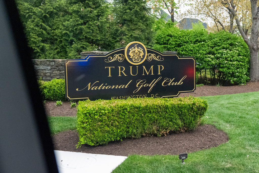 FILE - The sign for Trump National Golf Club is pictured as the motorcade for President Donald Trump arrives, April 19, 2025, in Sterling, Va. (AP Photo/Alex Brandon, File)